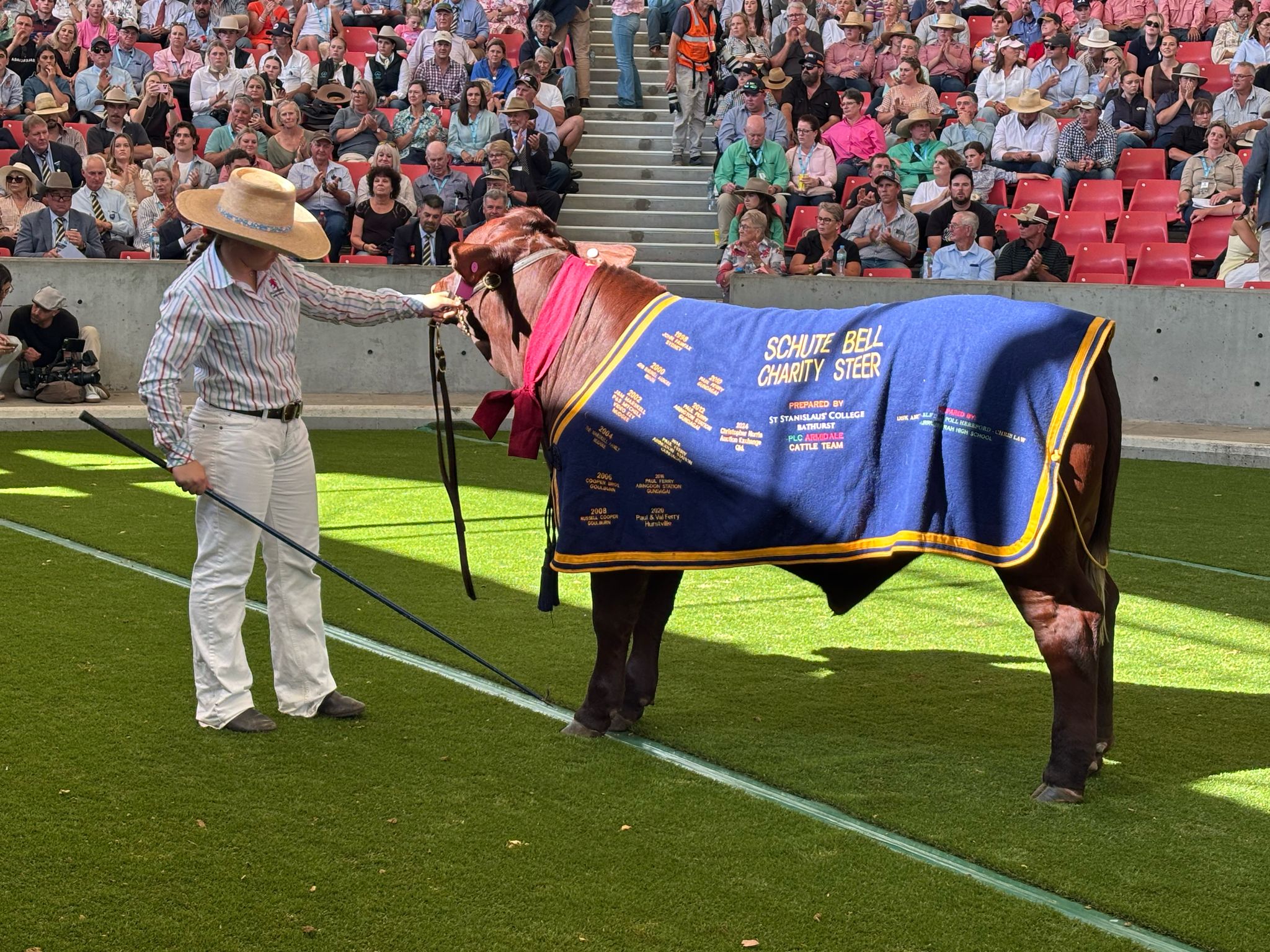 Students and farmers at the Charity Steer auction, Sydney Royal Easter Show
